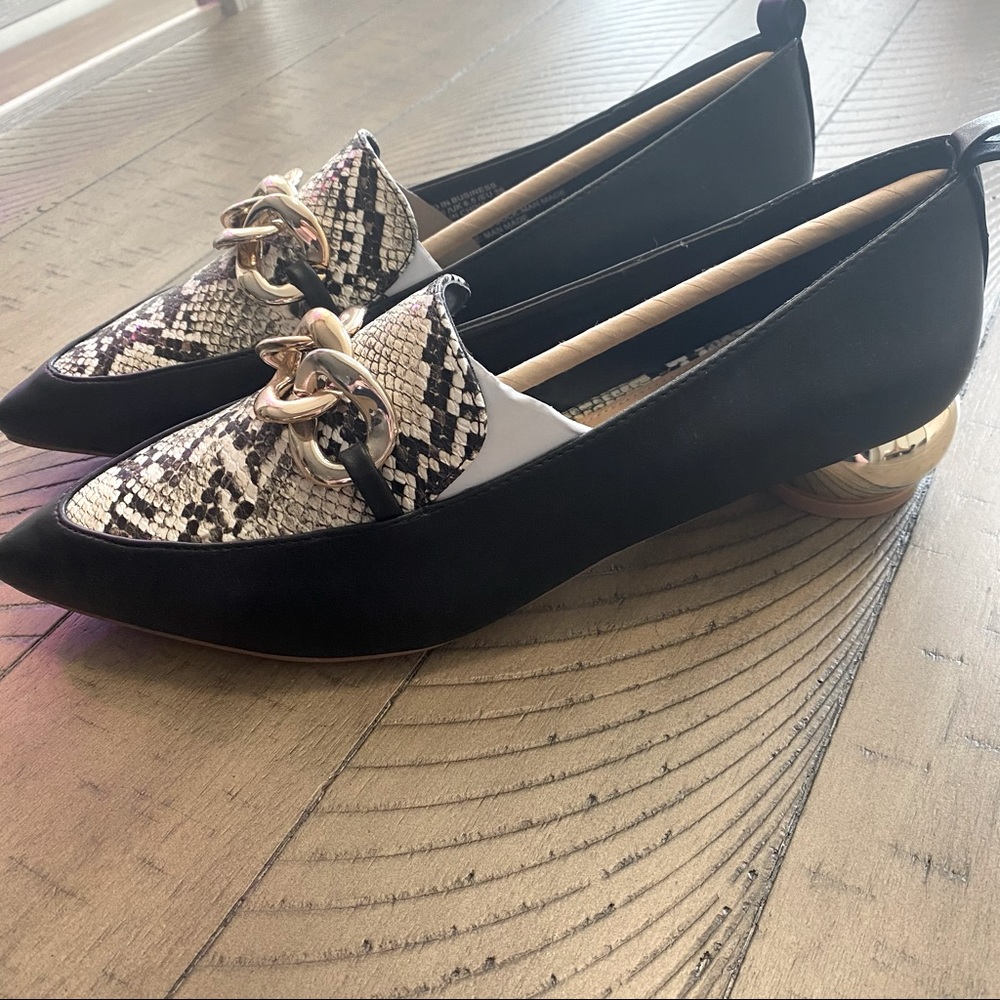 Black loafers flats with snakeskin and gold details. New size 8.5